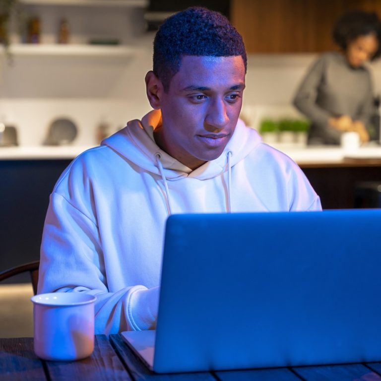 medium shot man typing